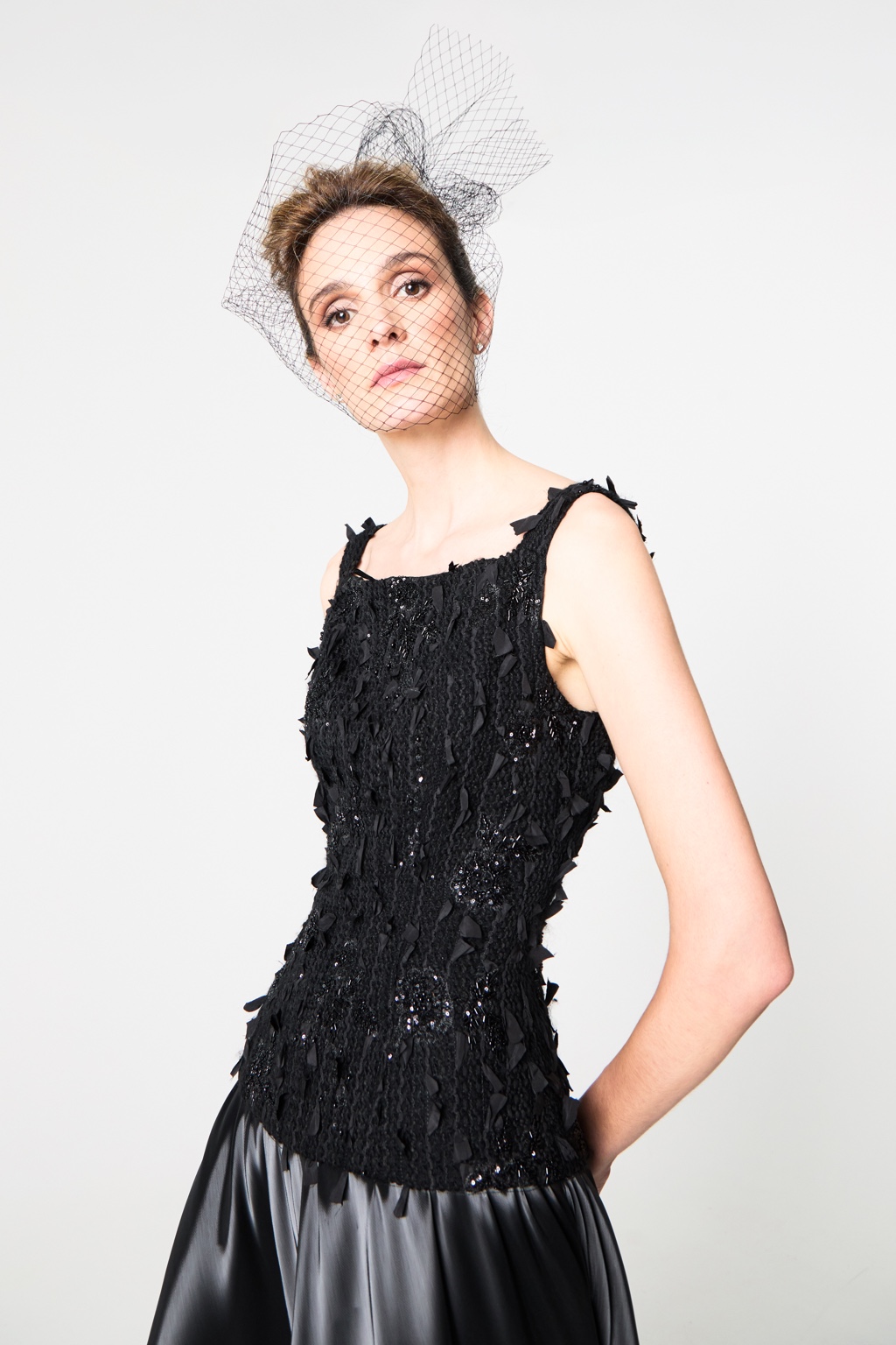Black evening look with textured bodice by Fely Campo