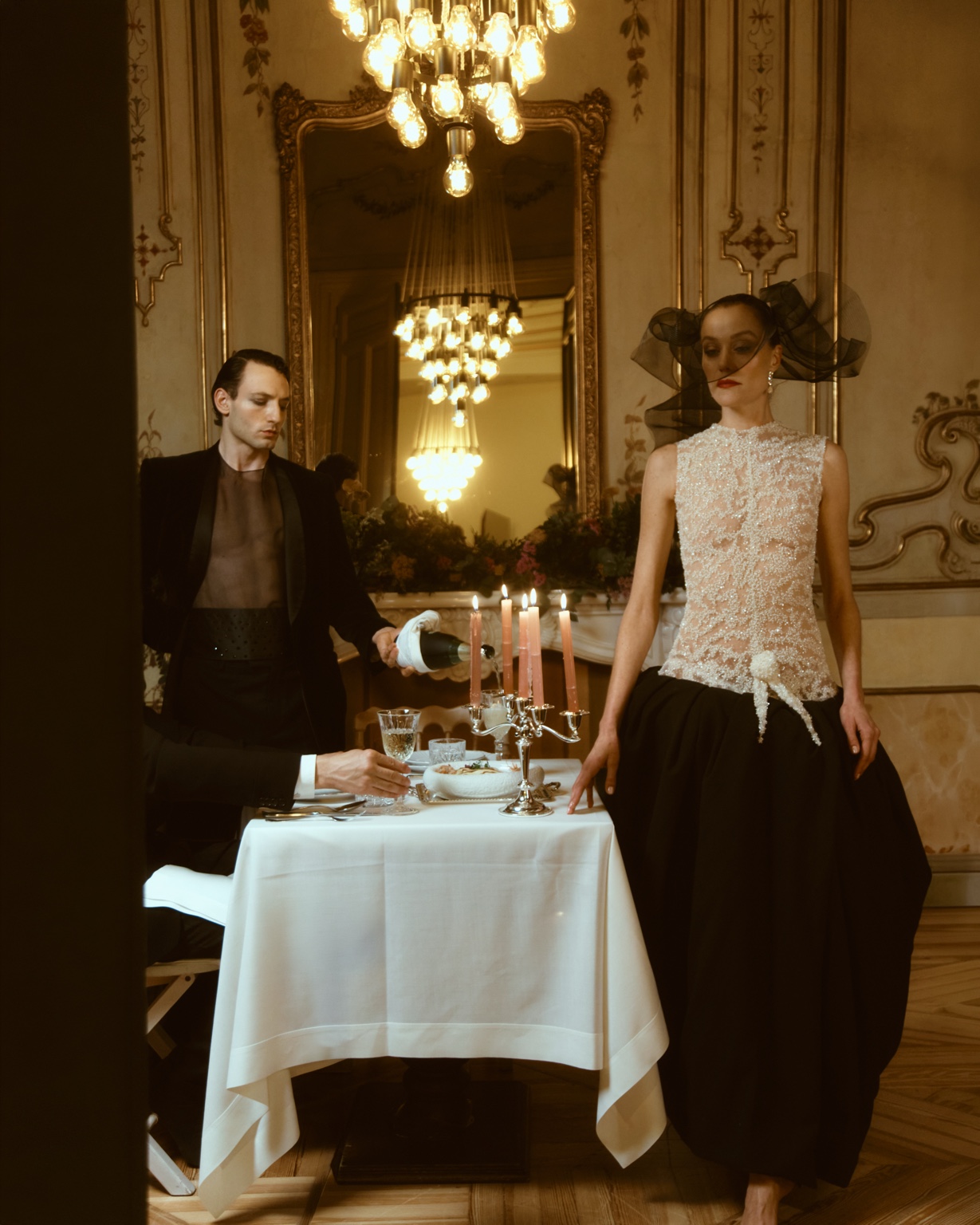 A dinner scene in an ornate room